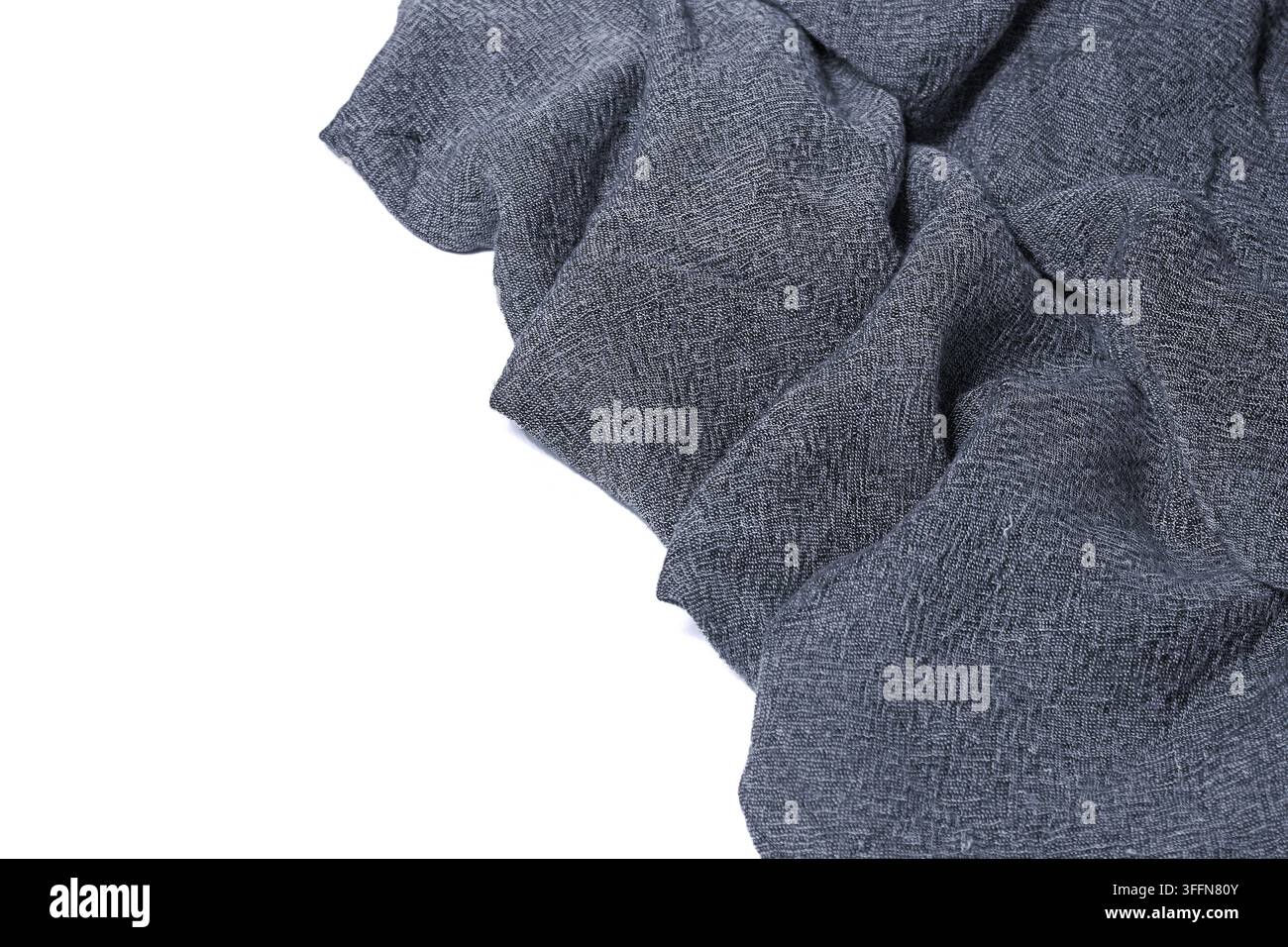 Tessuto a maglia melange grigio con pieghe su bianco Foto Stock