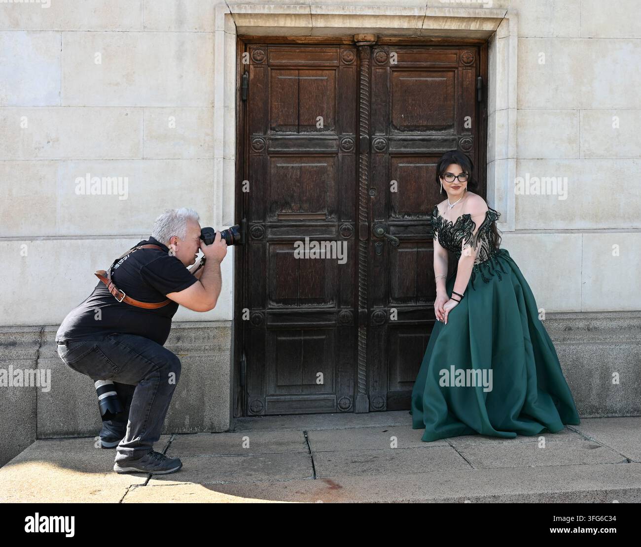 Il fotografo e il suo modello. Foto Stock