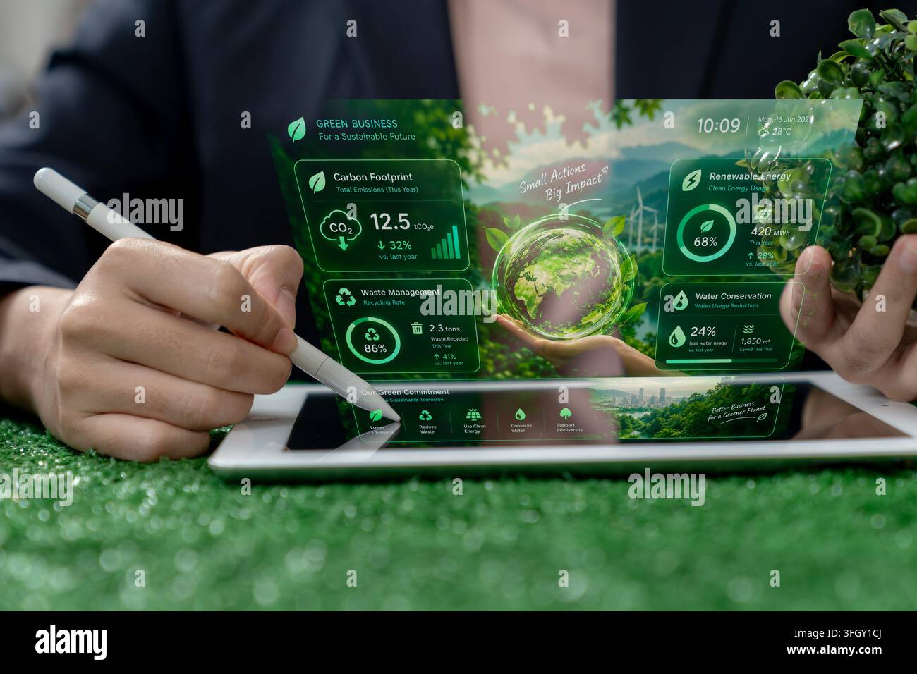 Primo piano di mani che utilizzano un tablet digitale che mostra infografie aziendali eco-compatibili e sostenibili. Foto Stock