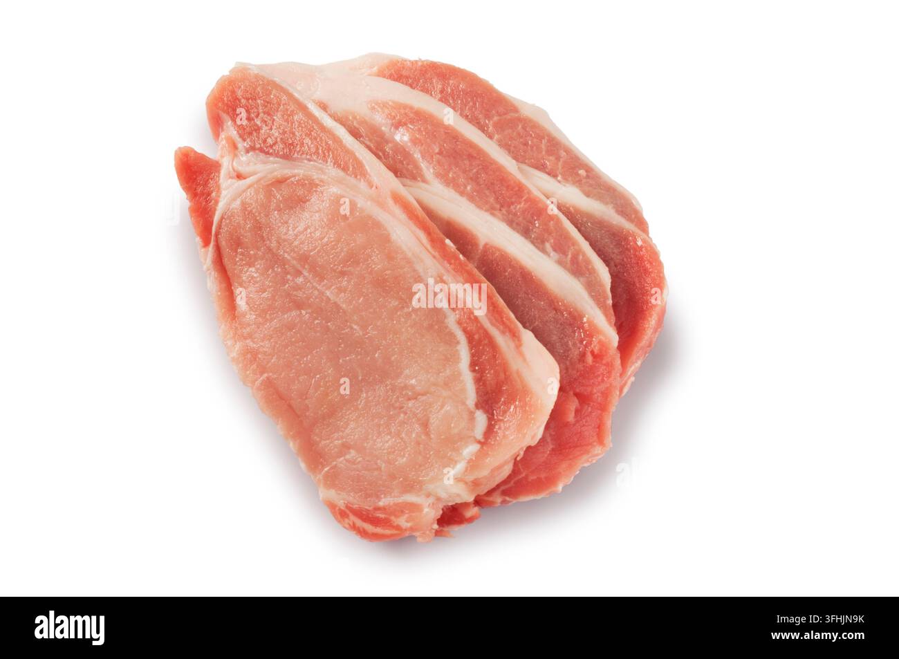 Scatto in studio di filetto di maiale crudo ritagliato su uno sfondo bianco. Foto Stock