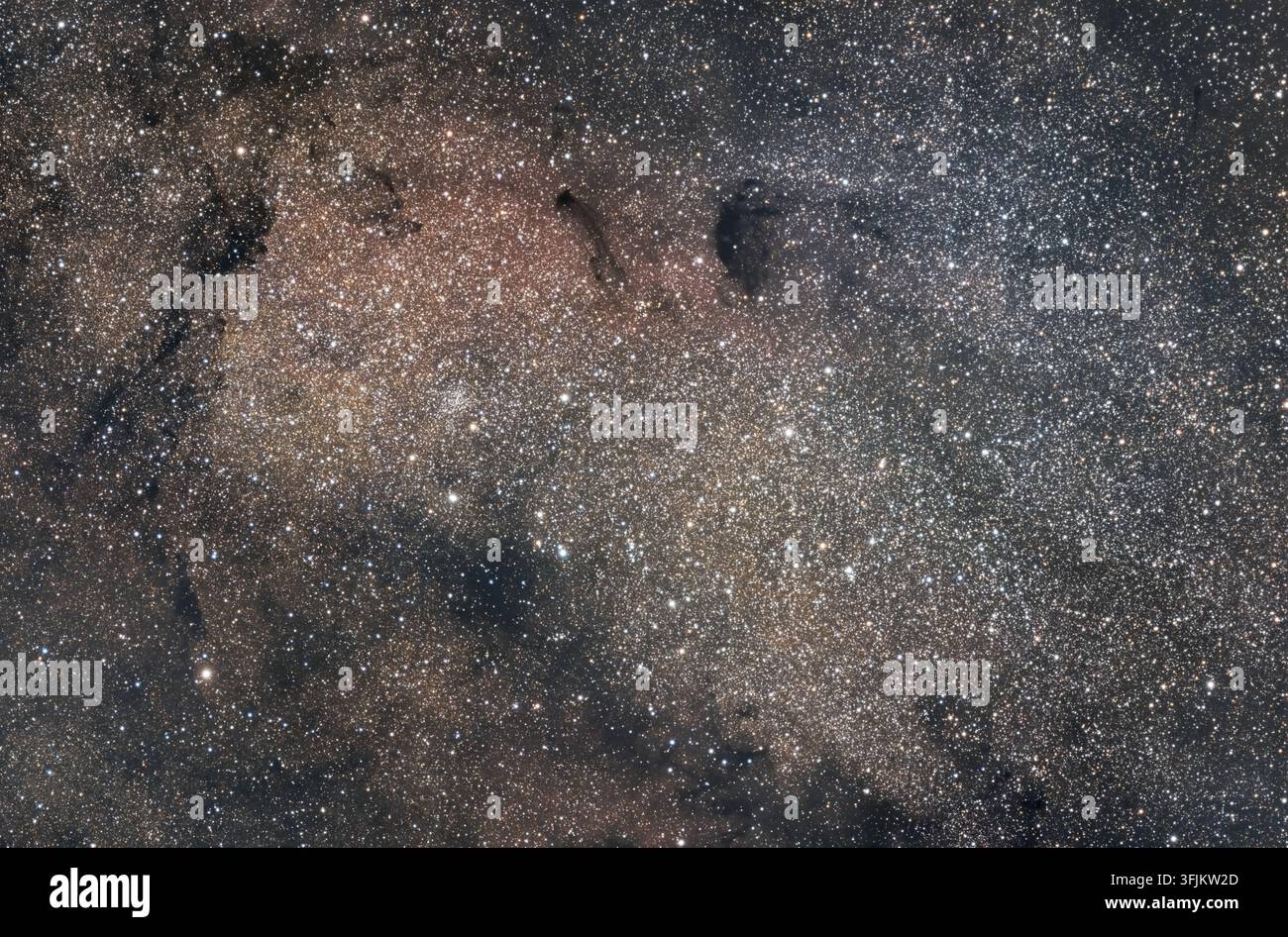 Messier 24, la Piccola Nube Stellare del Sagittario, una finestra densa sulla Via Lattea piena di innumerevoli stelle lontane. Foto Stock