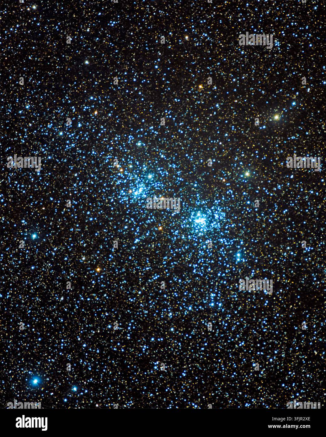 L'ammasso doppio di Perseo, i due ammassi aperti NGC 869 e NGC 884 (Caldwell 14), migliaia di soli blu e dorati stipati in un ammasso stellare denso Foto Stock