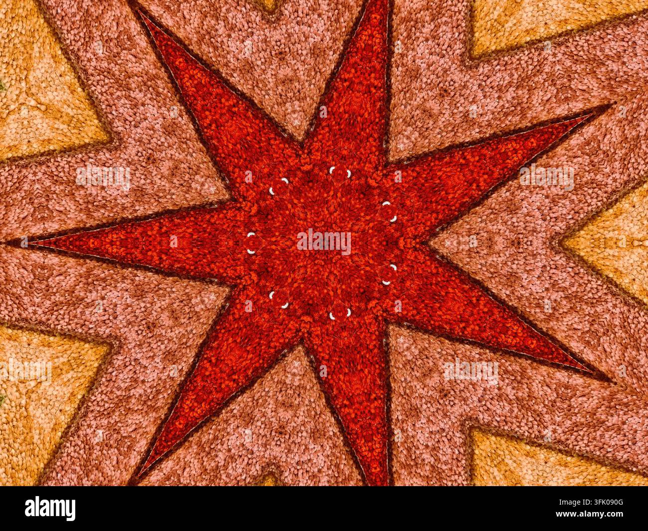 Motivo astratto a forma di stella rossa simmetrica con elementi geometrici Foto Stock