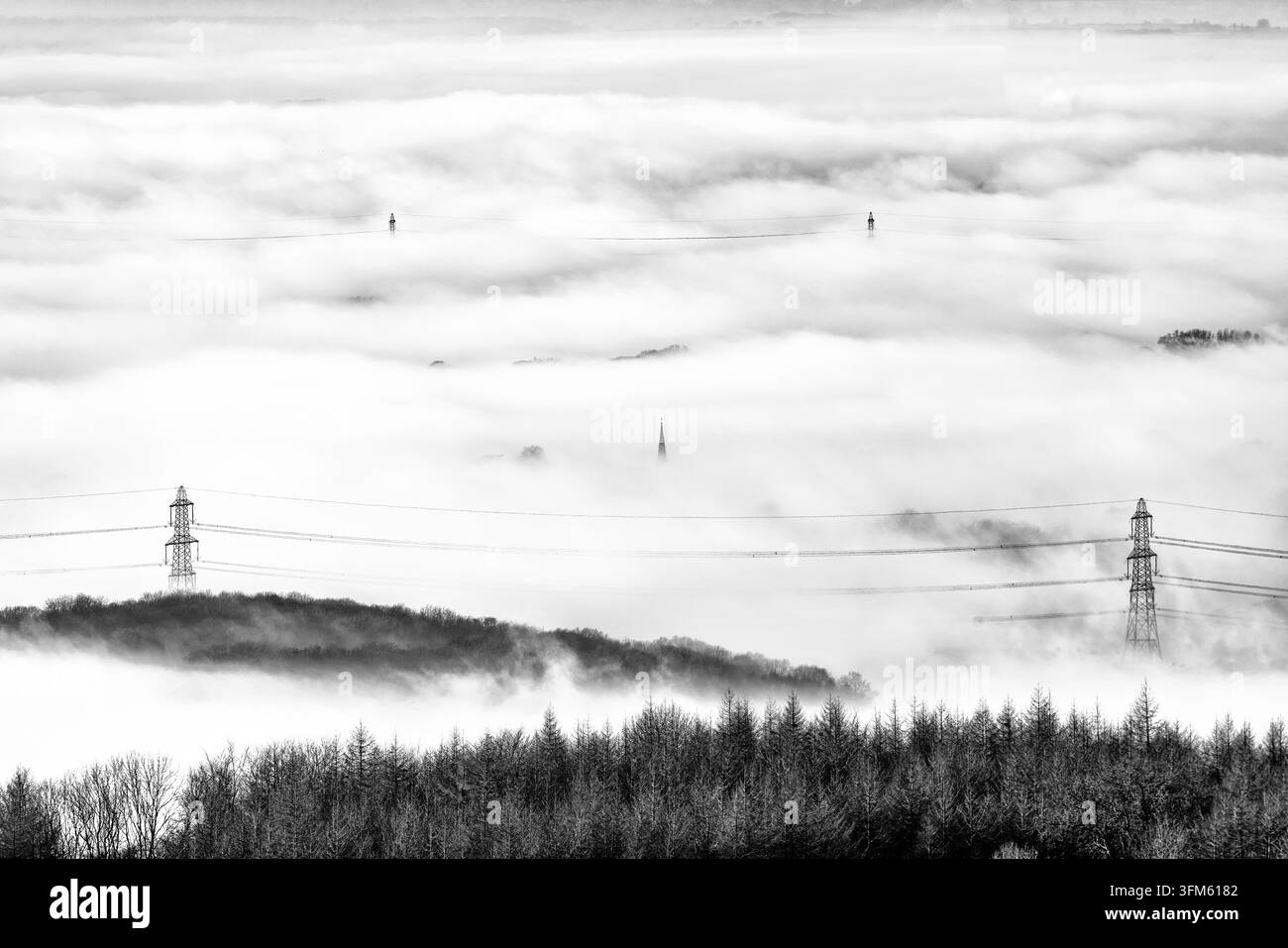 Nebbia di metà inverno e luce del sole sopra la vale di York vicino Thirsk. Foto Stock