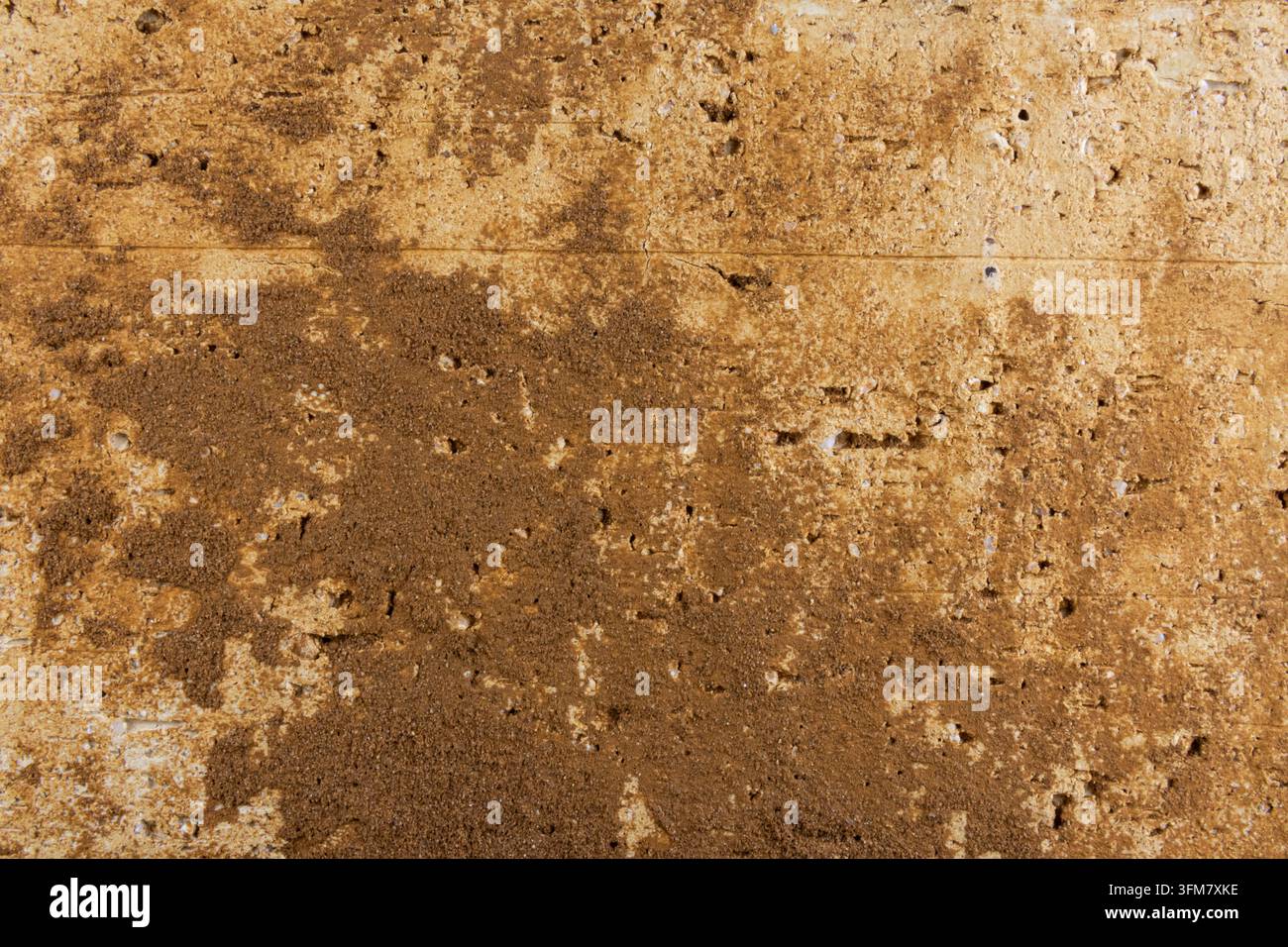 Texture di superficie porosa in mattoni marroni stagionati Foto Stock