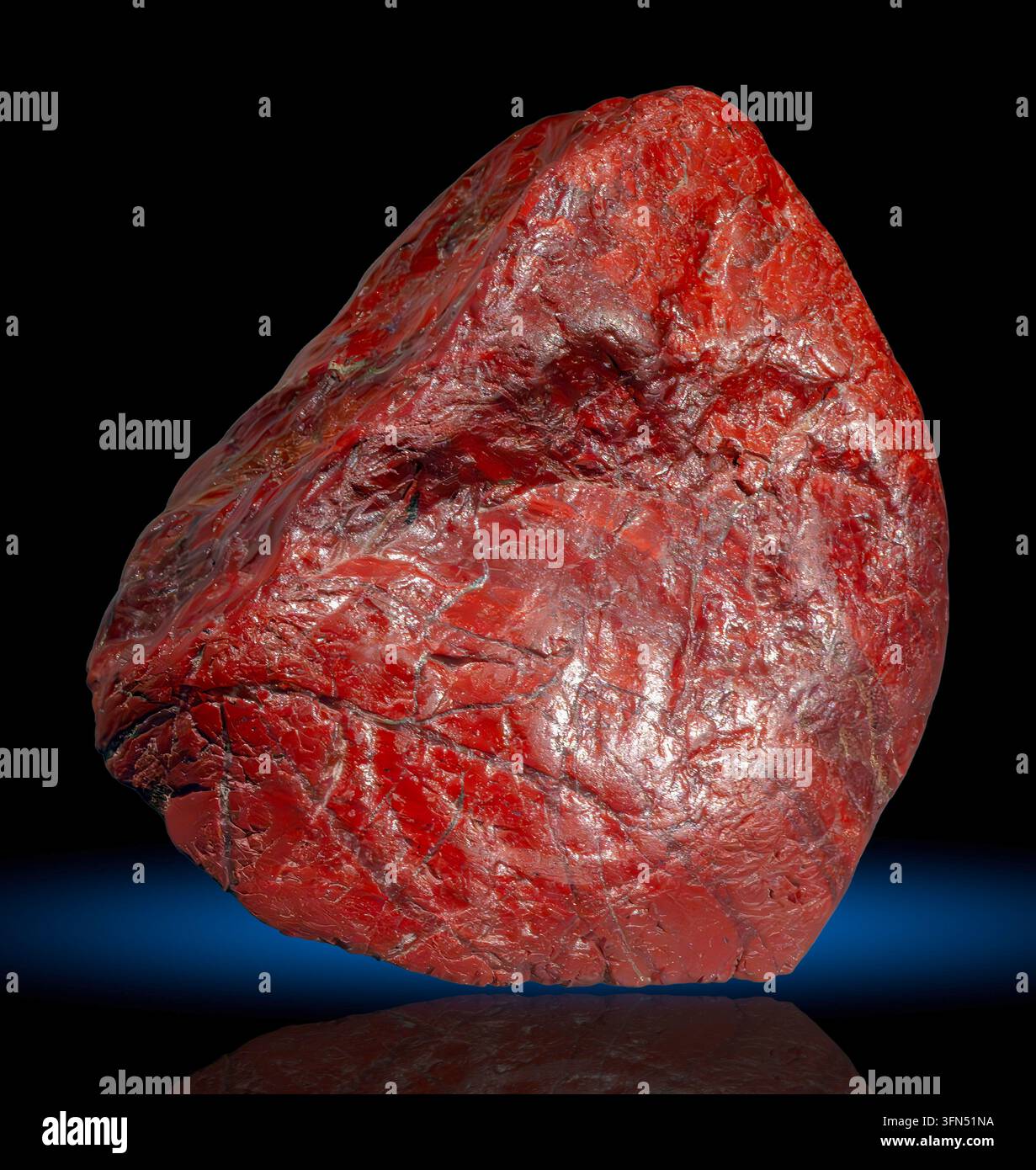 Il giaspe rosso è una varietà opaca e ricca di ferro del quarzo microcristallino, tipicamente colorata di rosso intenso a marrone rossastro dagli ossidi di ferro. Foto Stock