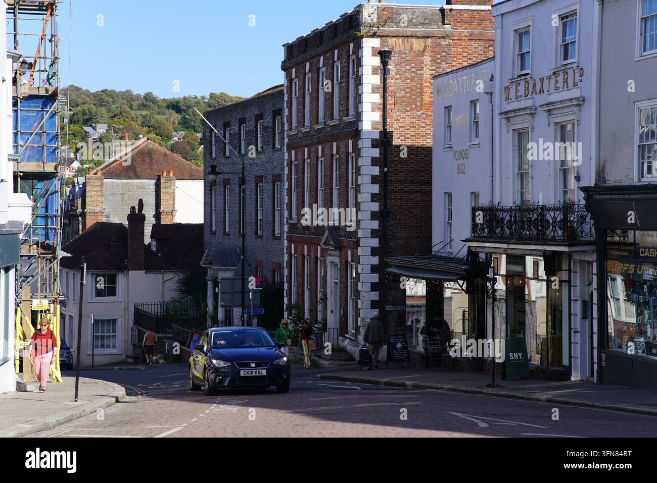 Ex stabilimento di stampa W.E. Baxter su High Street a Lewes, in Inghilterra, ora un negozio di gastronomia. Foto Stock