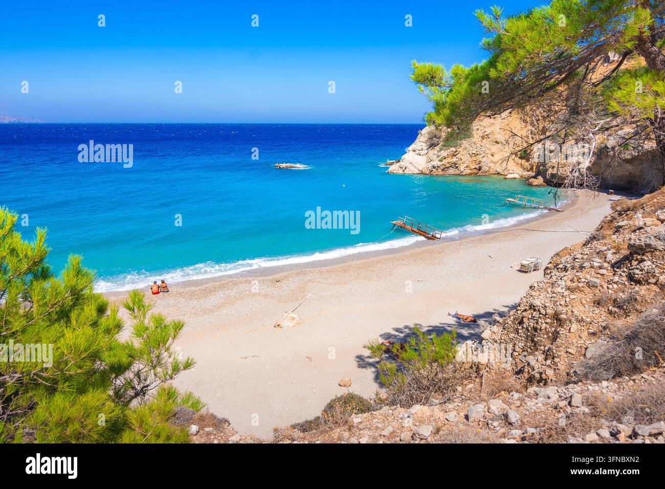 Spiaggia di Apella sull'isola di Karpathos, Grecia, con acqua turchese cristallina Foto Stock