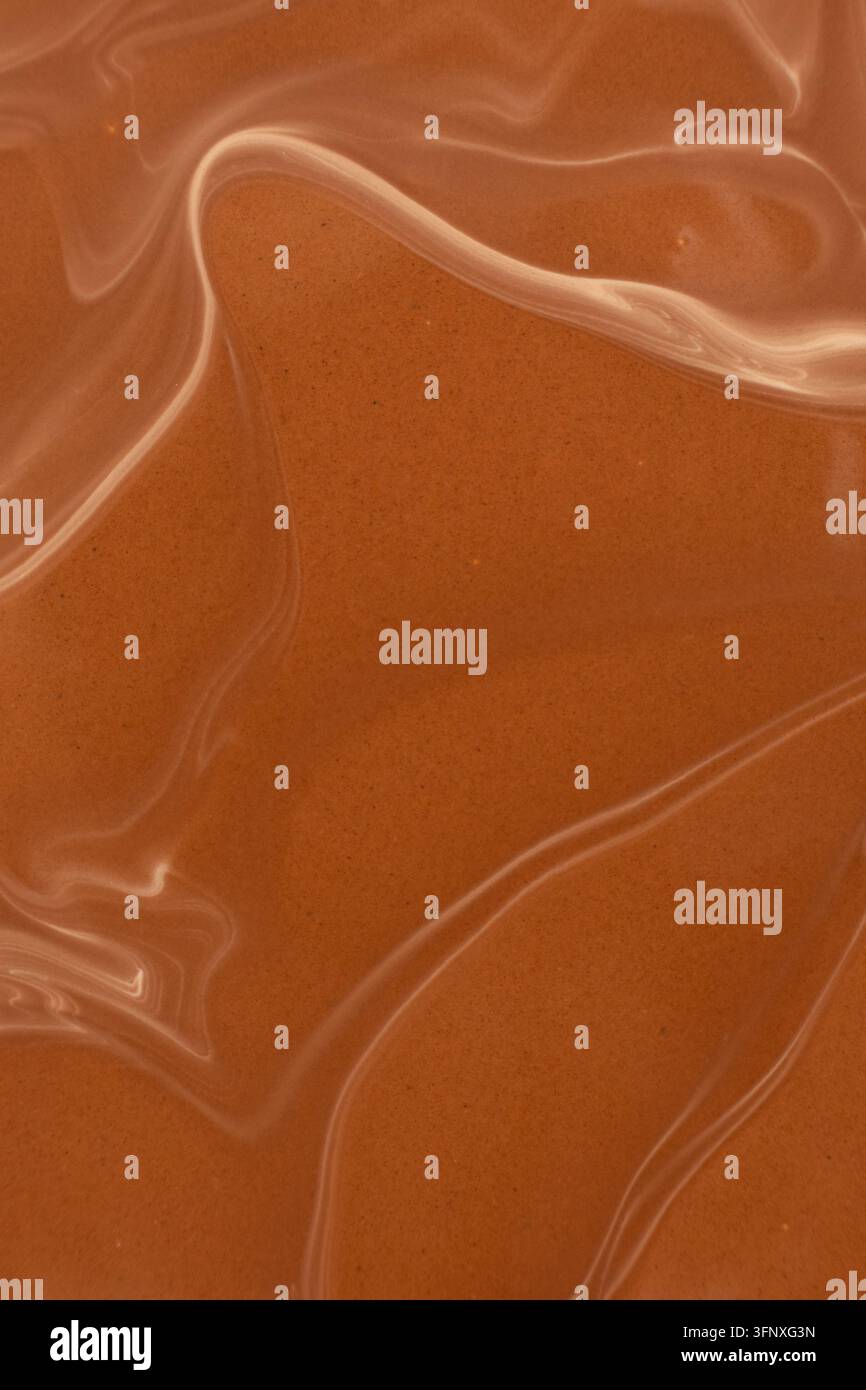 Motivo a onde lisce e calde al cioccolato, fotografia macro Foto Stock