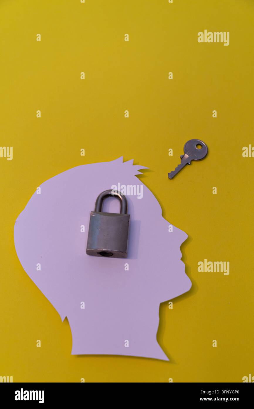 L'immagine simboleggia blocchi mentali, idee nascoste o la necessità di una soluzione. Concetto di salute mentale. Foto Stock