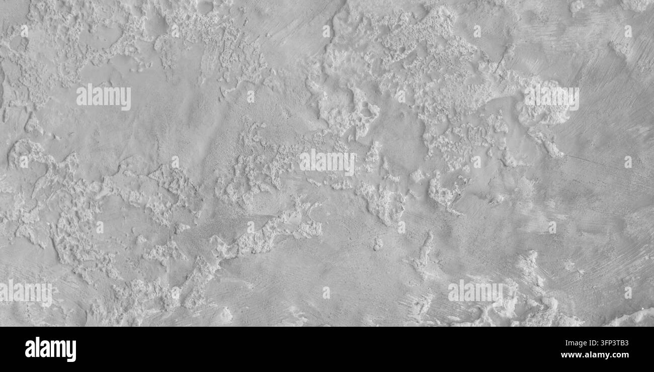 Uno sfondo con una texture di un muro di cemento grigio. Foto Stock