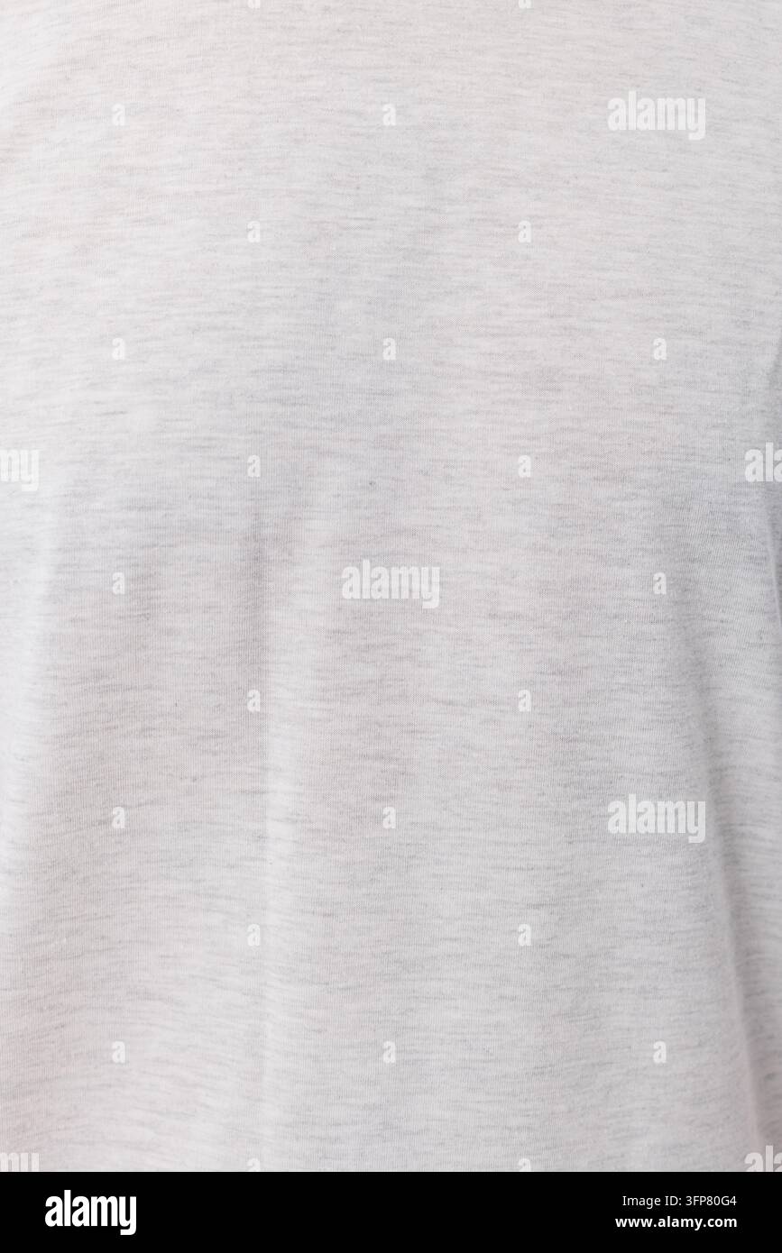 Prima vista di una trama di tessuto grigio chiaro melange. Materiale jersey di cotone malleabile. Ideale per sfondi, moda, abbigliamento, motivi tessili. Senza cuciture Foto Stock