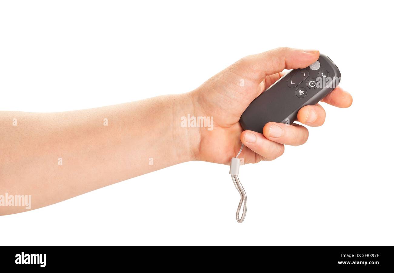 Telecomando per ventilatore nella mano, percorso isolato su bianco Foto Stock