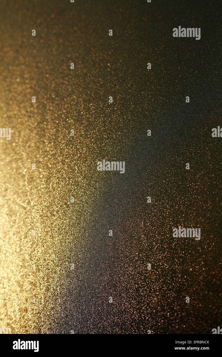 Sfondo dorato sfocato astratto. Textura senza cuciture. Foto Stock