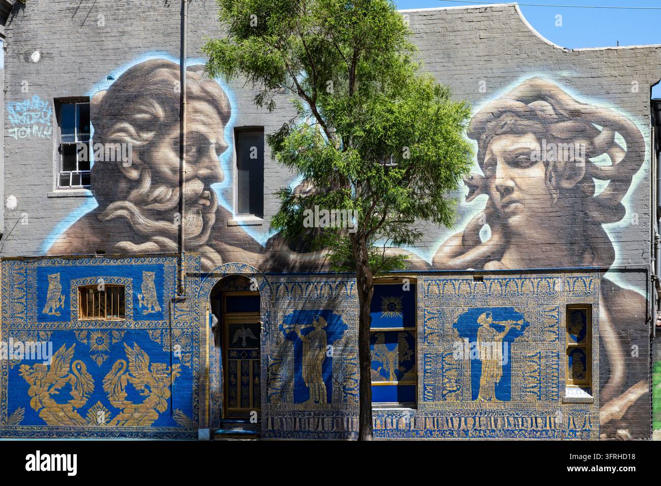 Street art Janus a due facce di Andrea Casciu, Newtown, NSW, Australia Foto Stock