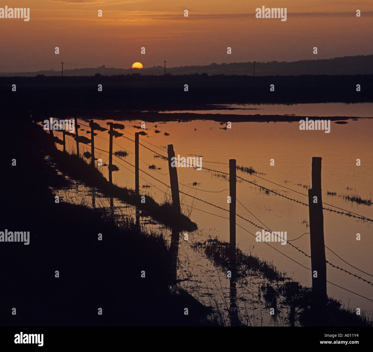 Cley paludi Norfolk UK Winter crepuscolo Foto Stock
