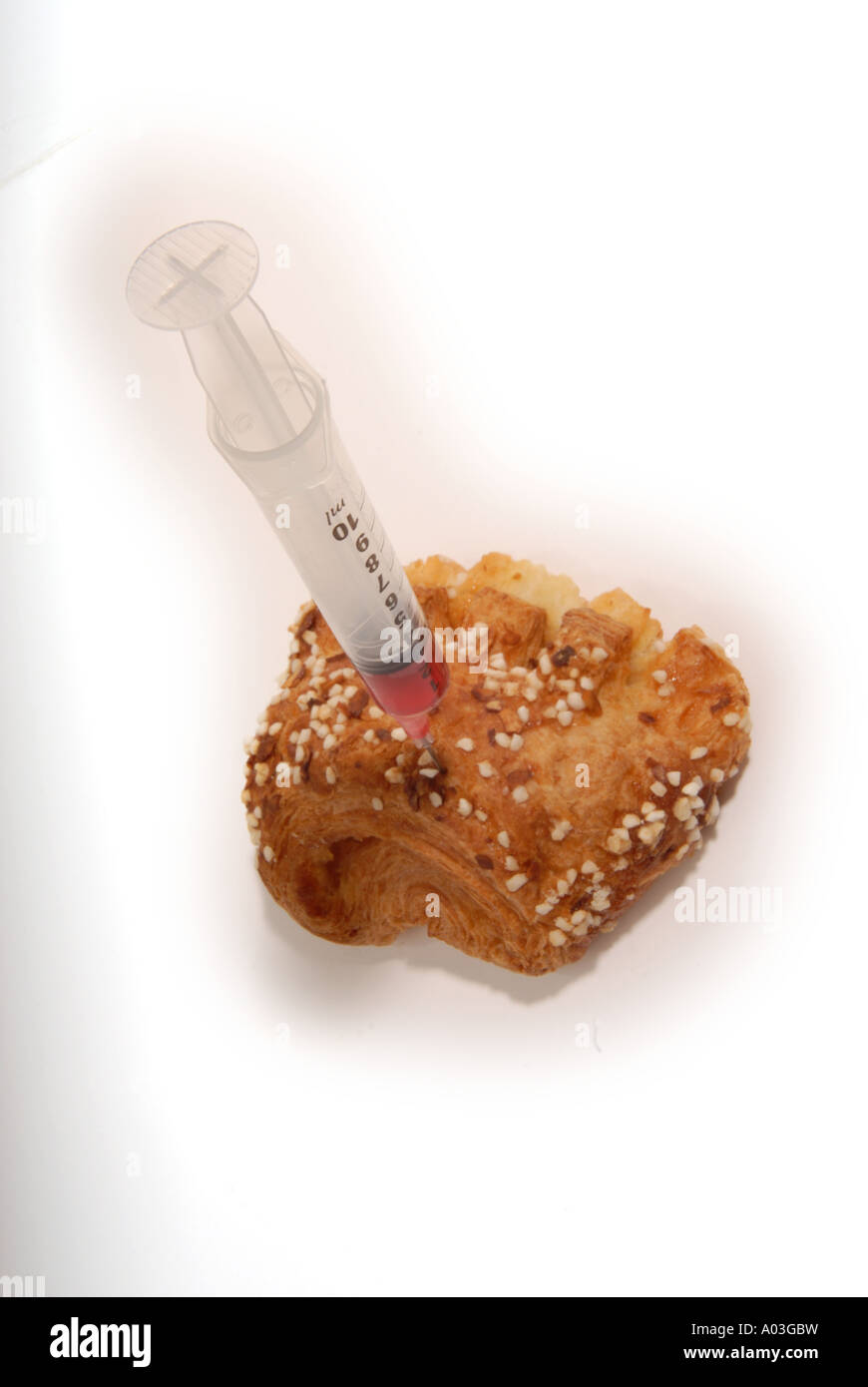La pasticceria con la siringa il diabete Foto Stock