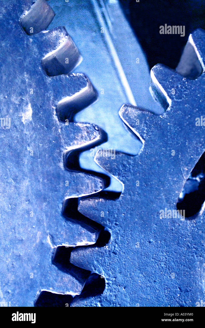 Extreme close up di metallo di grandi dimensioni ingranaggi industriali Foto Stock