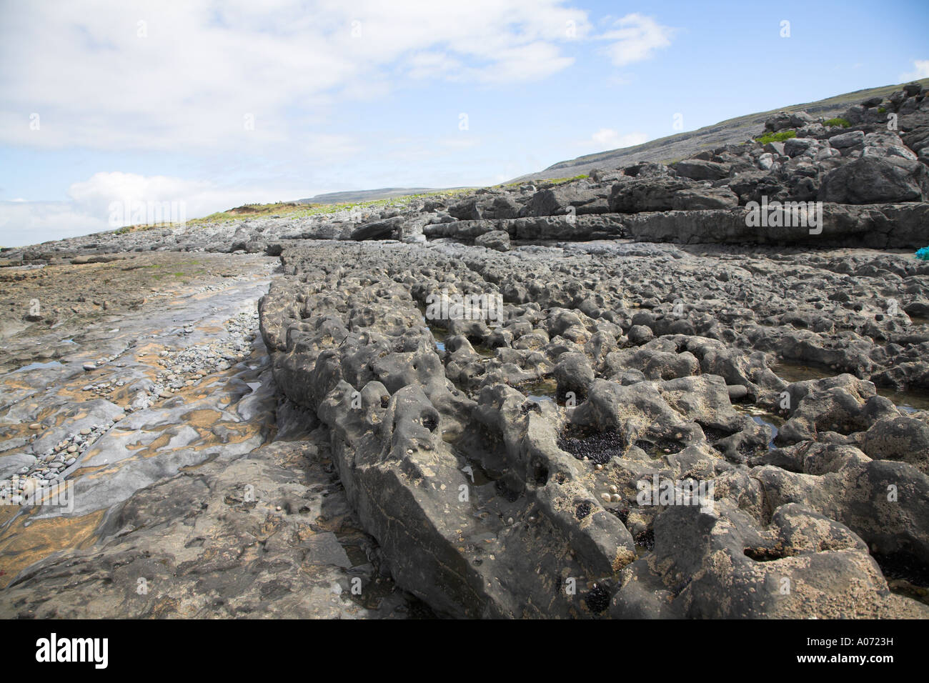 Tra la zona di marea Fanore beach County Clare Irlanda Foto Stock