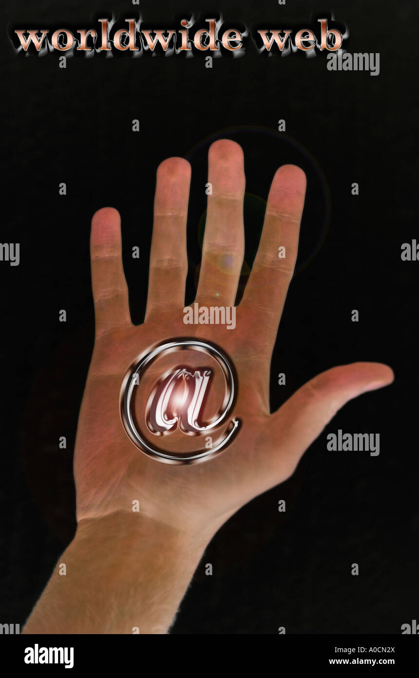 Digital composito di palma umana e a Symbol in tutto il mondo di web Foto Stock