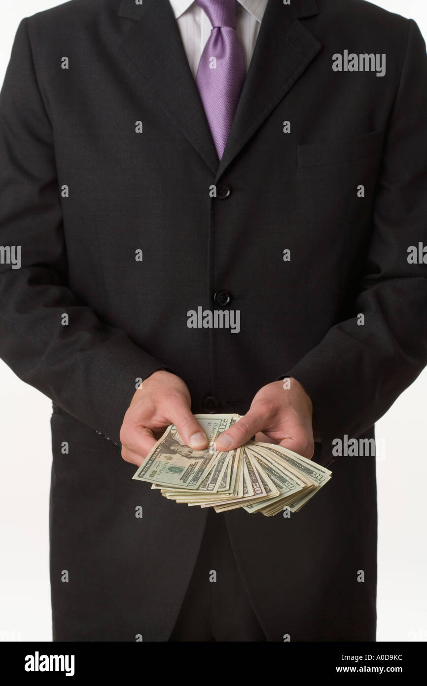 Uomo con il denaro americano Foto Stock