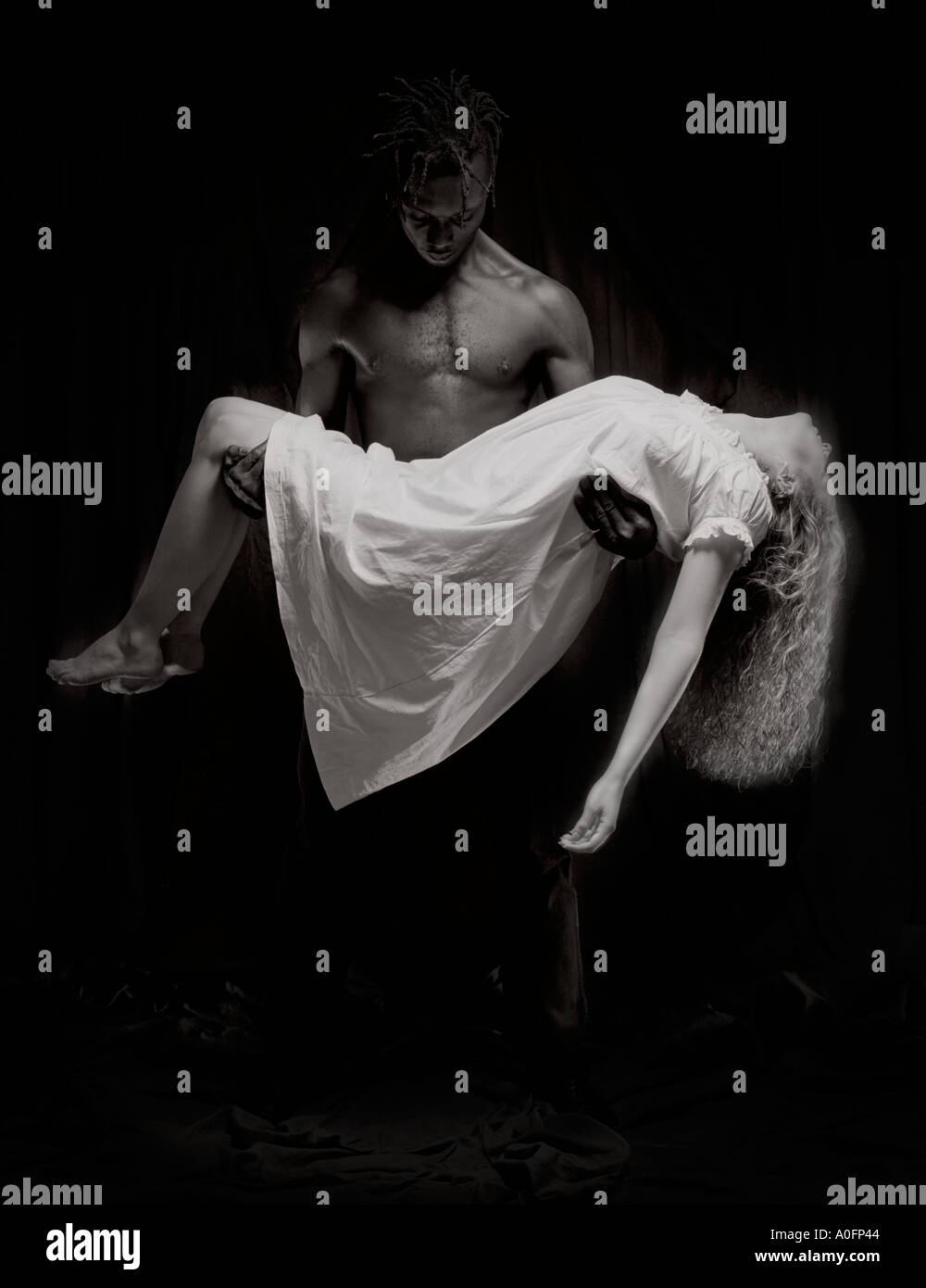 Una posa teatrale evoca dolore Foto Stock