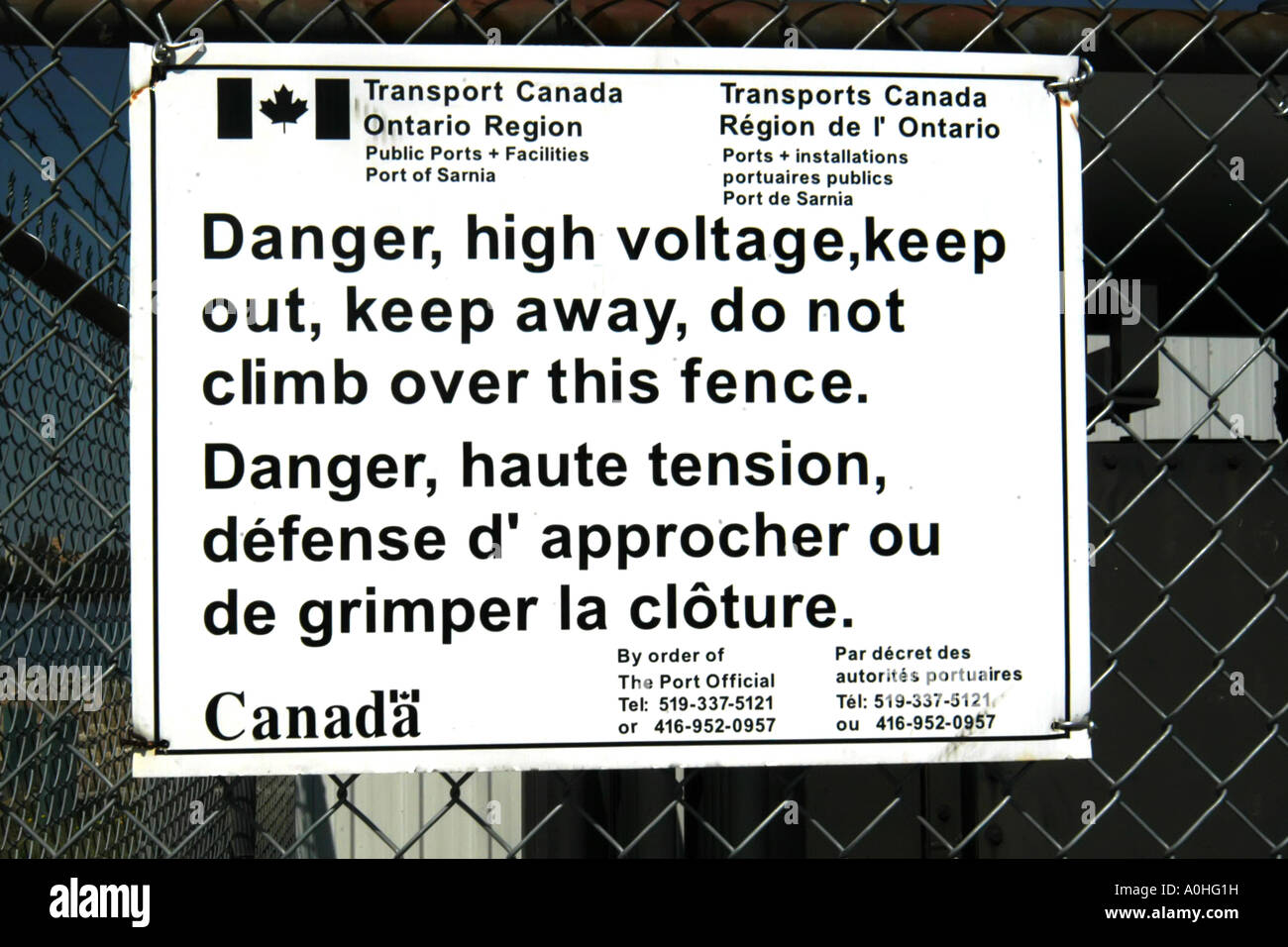 Segnaletica di pericolo sia in inglese che in francese in Canada Foto Stock