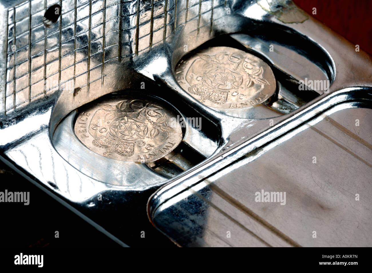Coin slot per un tavolo da biliardo Foto Stock