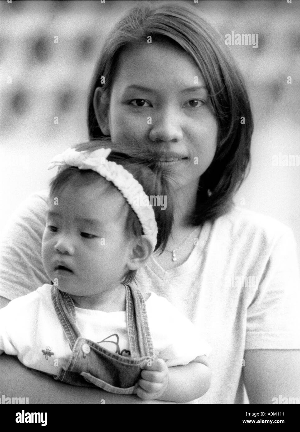Mamma e bimbo piccolo ragazza ritratto Foto Stock