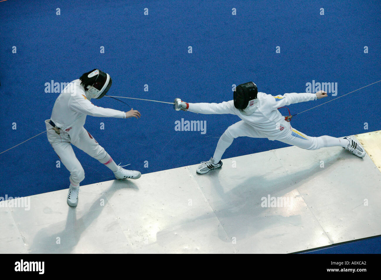 Cina L vs Ucraina epee bout durante la Sfida Monal a Parigi il 14 marzo 2004 Foto Stock