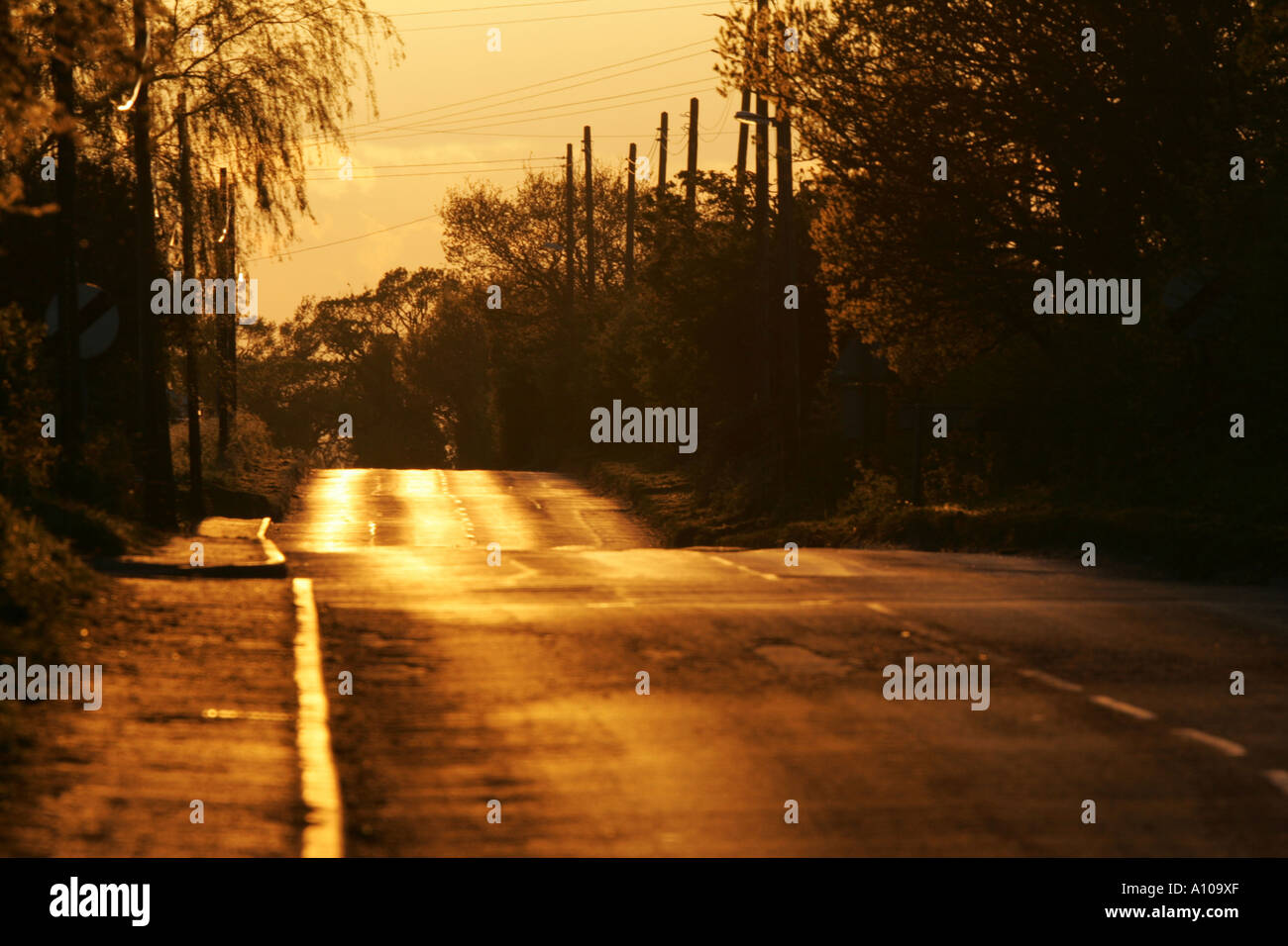 strada al tramonto Foto Stock