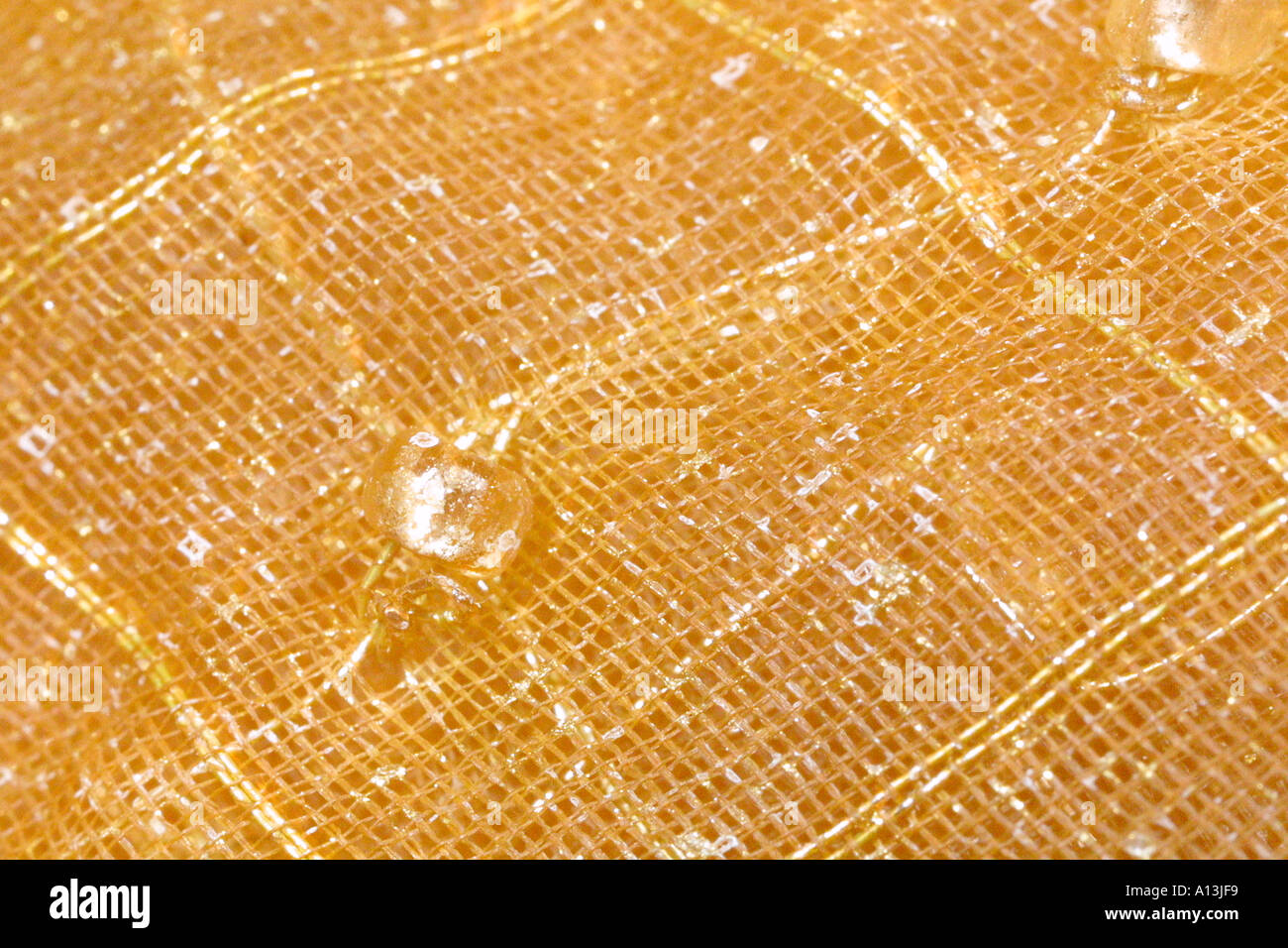 Tessuto oro closeup Foto Stock
