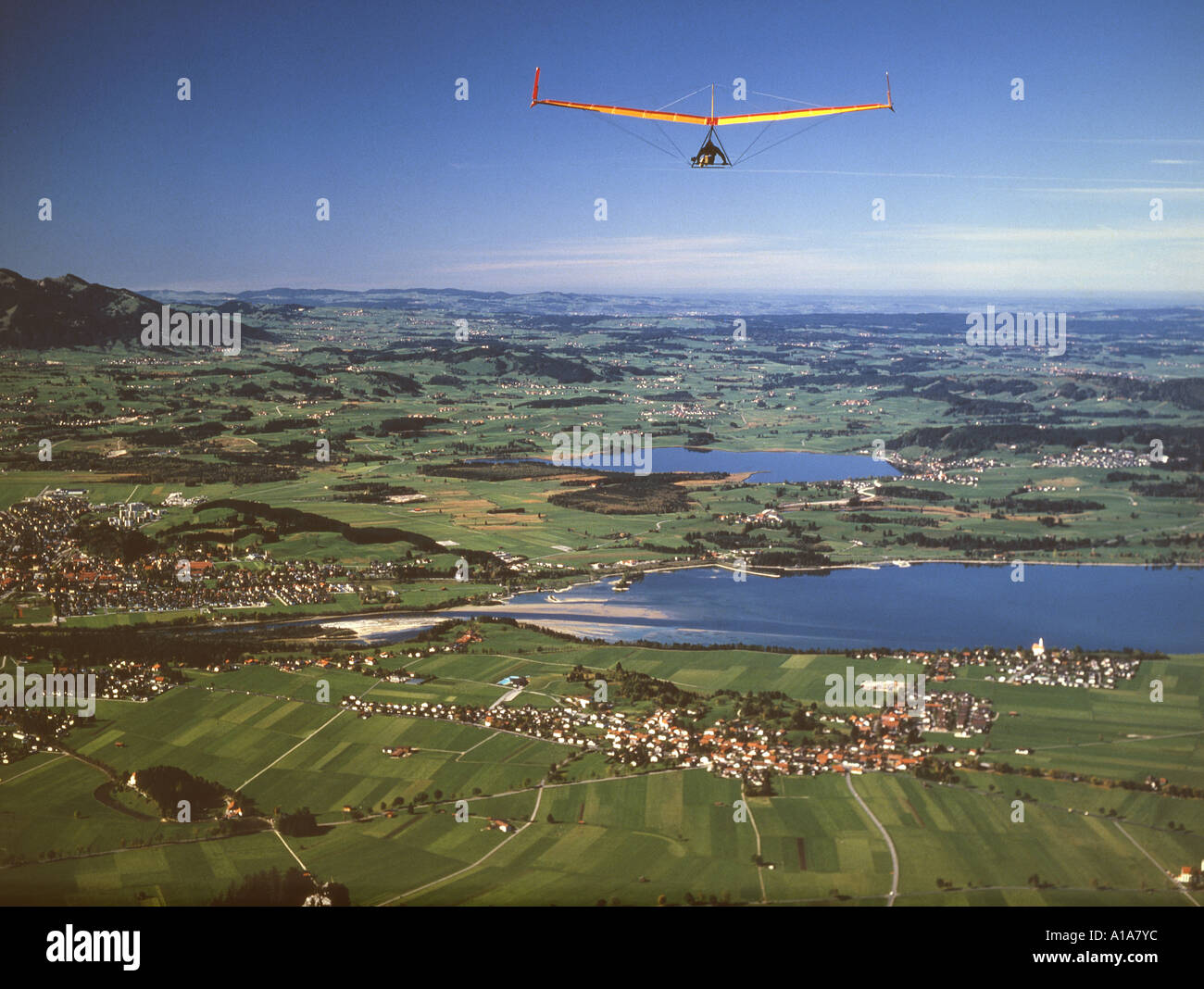 Deltaplano Drachenflieger über dem Forggensee Foto Stock