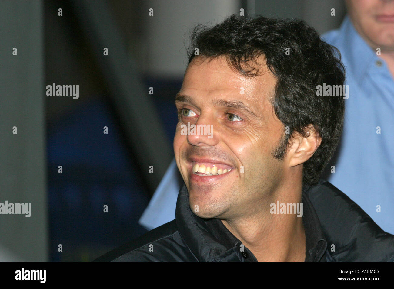 Il pilota della MotoGP Loris Capirossi sorridente presso l'odissea di supercross indoor Odyssey Arena Belfast Irlanda del Nord Foto Stock