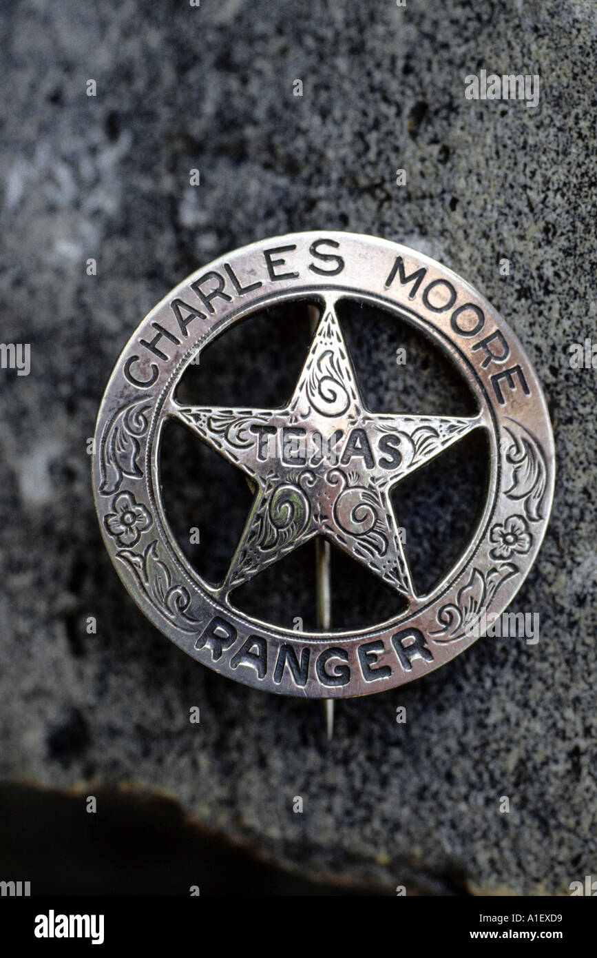 Un segno distintivo di cerchio e star Texas Ranger badge appartenenti a Charles Moore Foto Stock