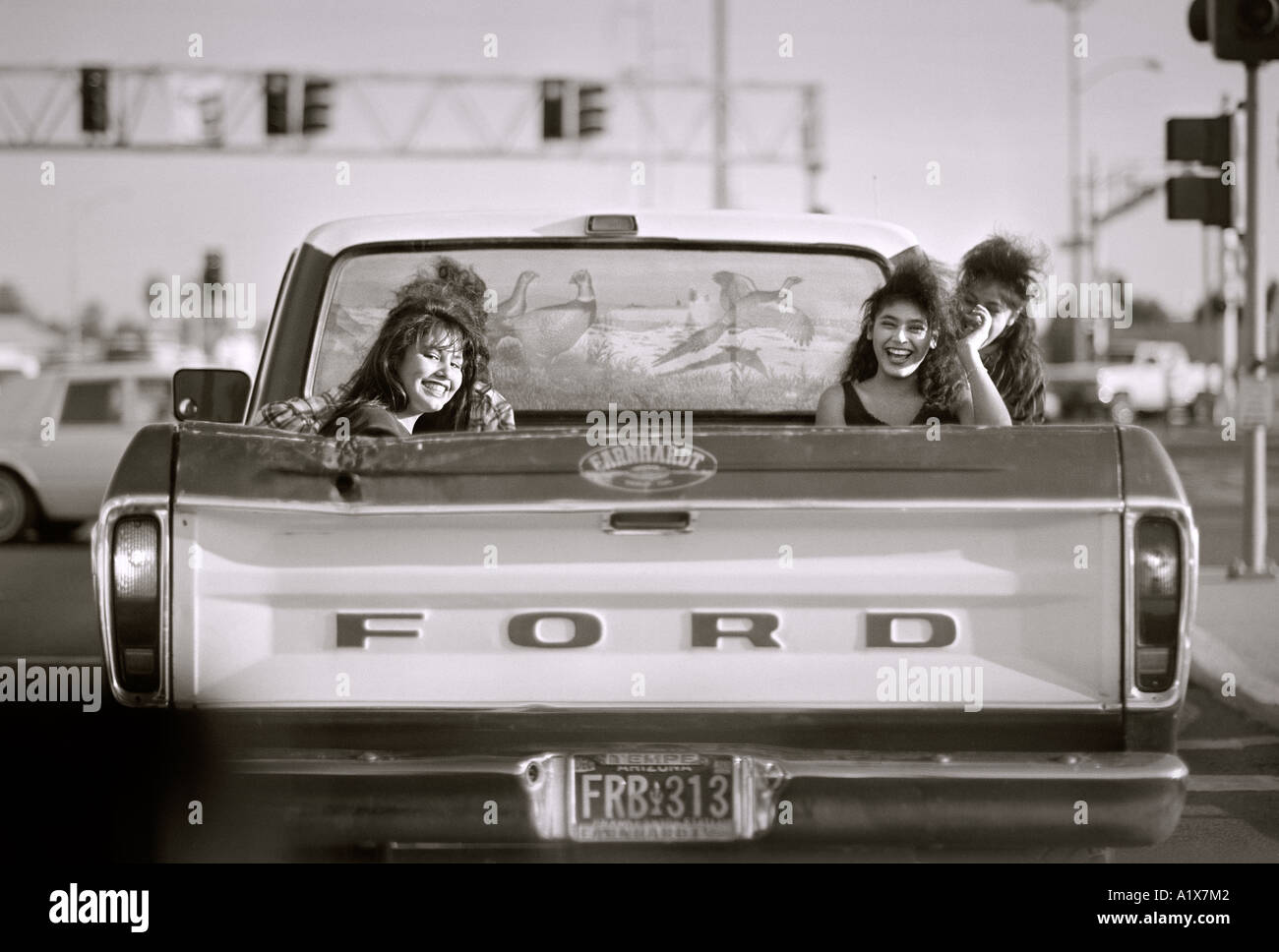 Ford pick-up con 3 ragazze in retro, Phoenix in Arizona, Stati Uniti. Foto Stock