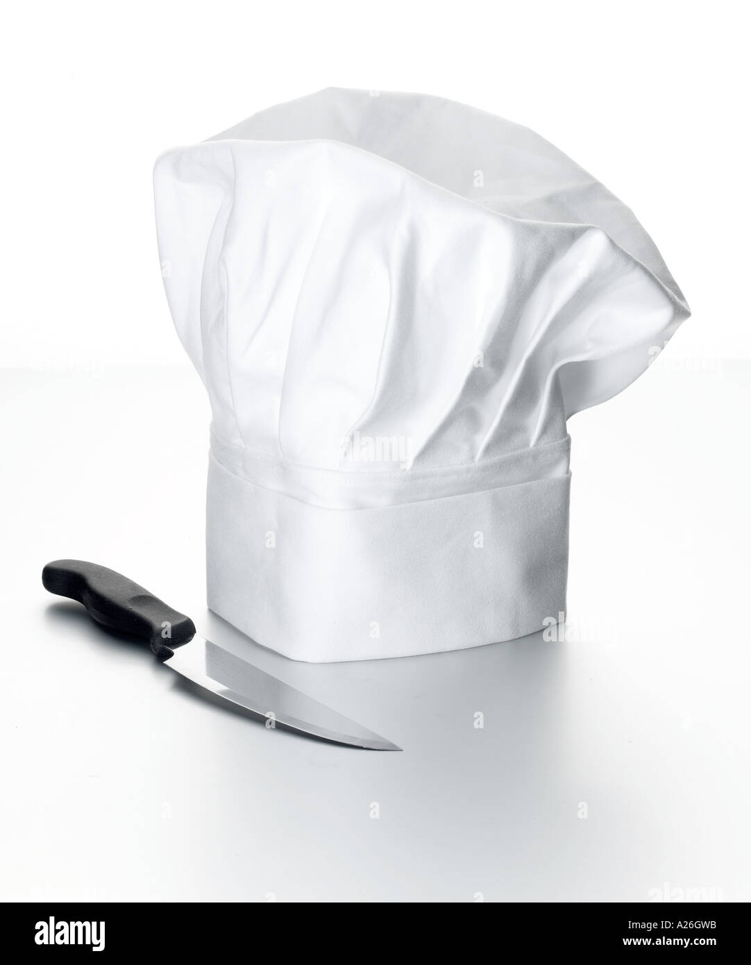 Cappellino dello chef e scuola di cucina coltello imparare professione di mestiere di abilità capo chef professionista della cucina Foto Stock