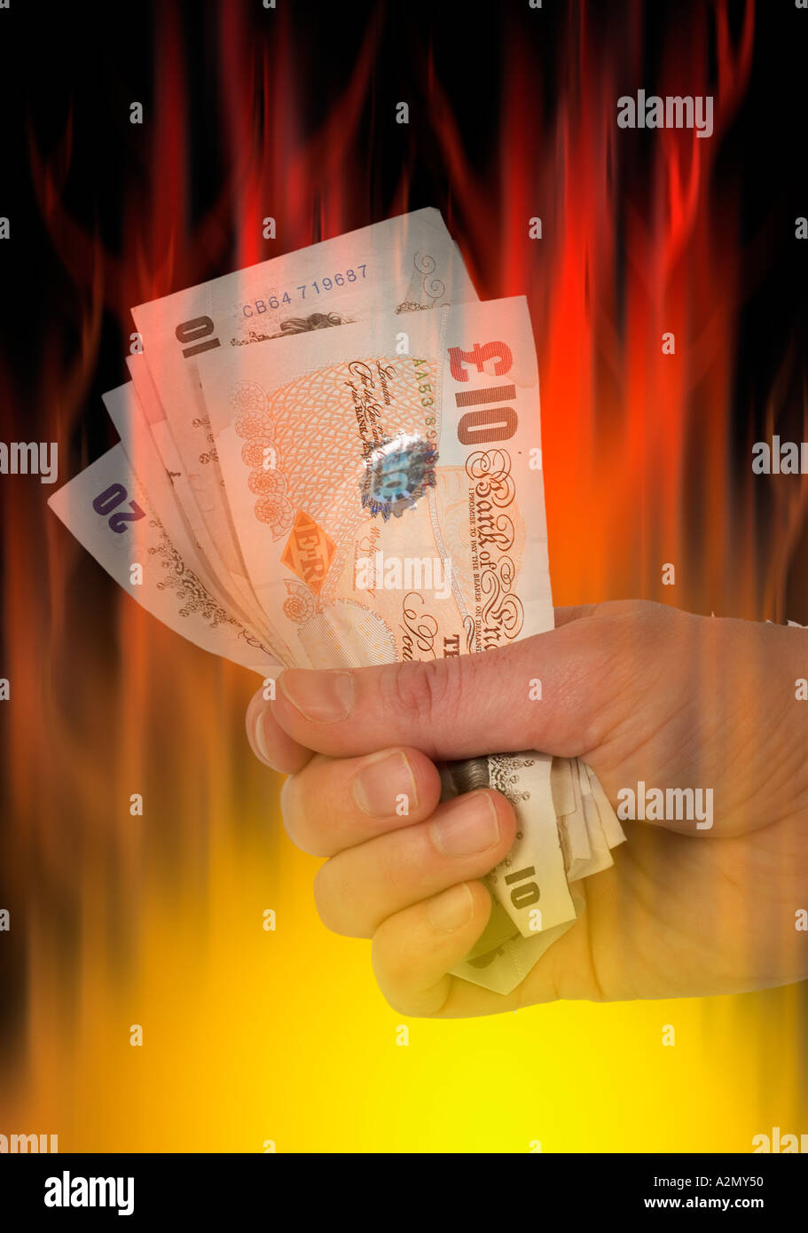 Spreco di denaro sprecando distruggere brutto affare perdita di profitto fiamma di investimento fuoco bruci dollar pound valuta la masterizzazione di flash di calore em Foto Stock
