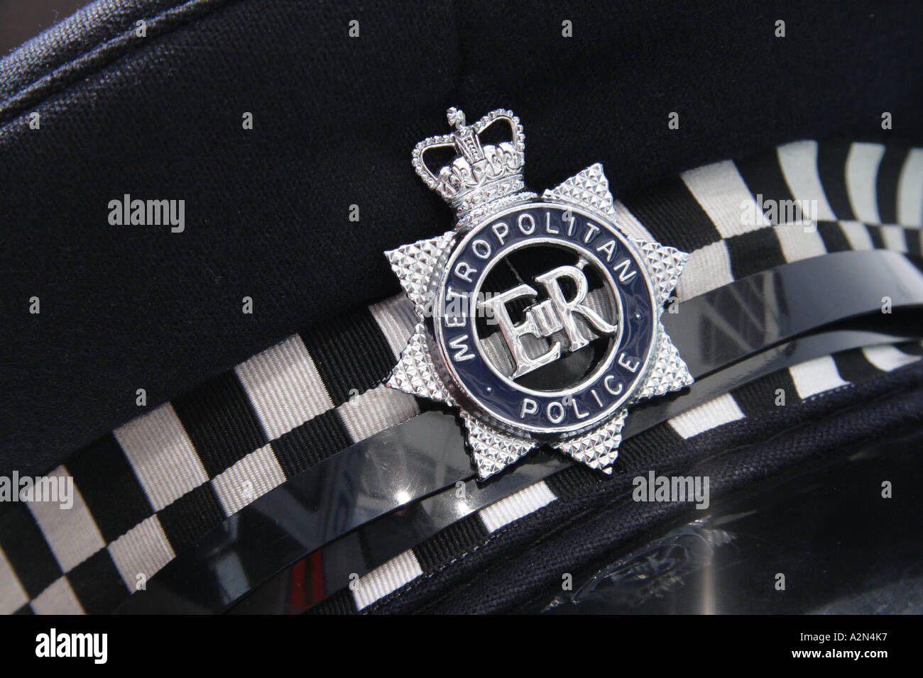 Close up dettaglio di un London Metropolitan Police Cap Foto Stock