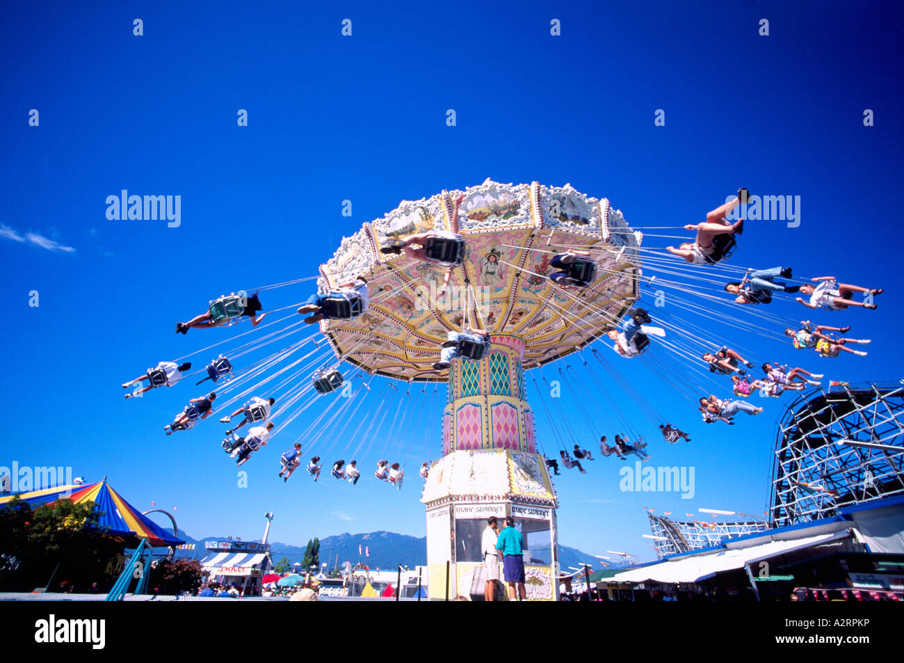 'Wave Swinger' parco dei divertimenti di cavalcare a Playland, Pacific National Exhibition (PNE), Vancouver, BC, British Columbia, Canada Foto Stock