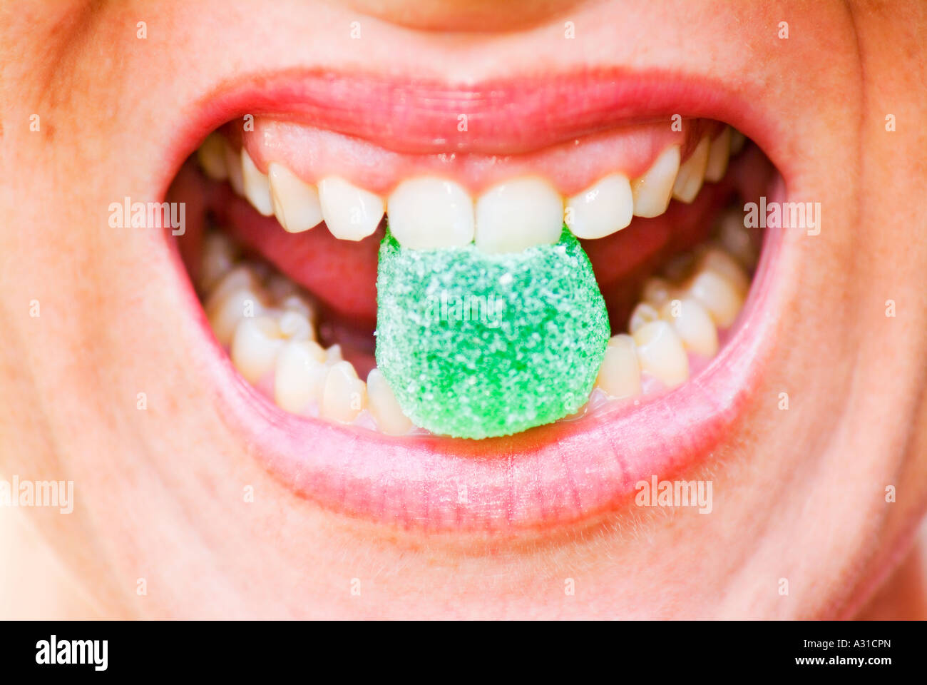 In prossimità della bocca con sugarcoat Foto Stock