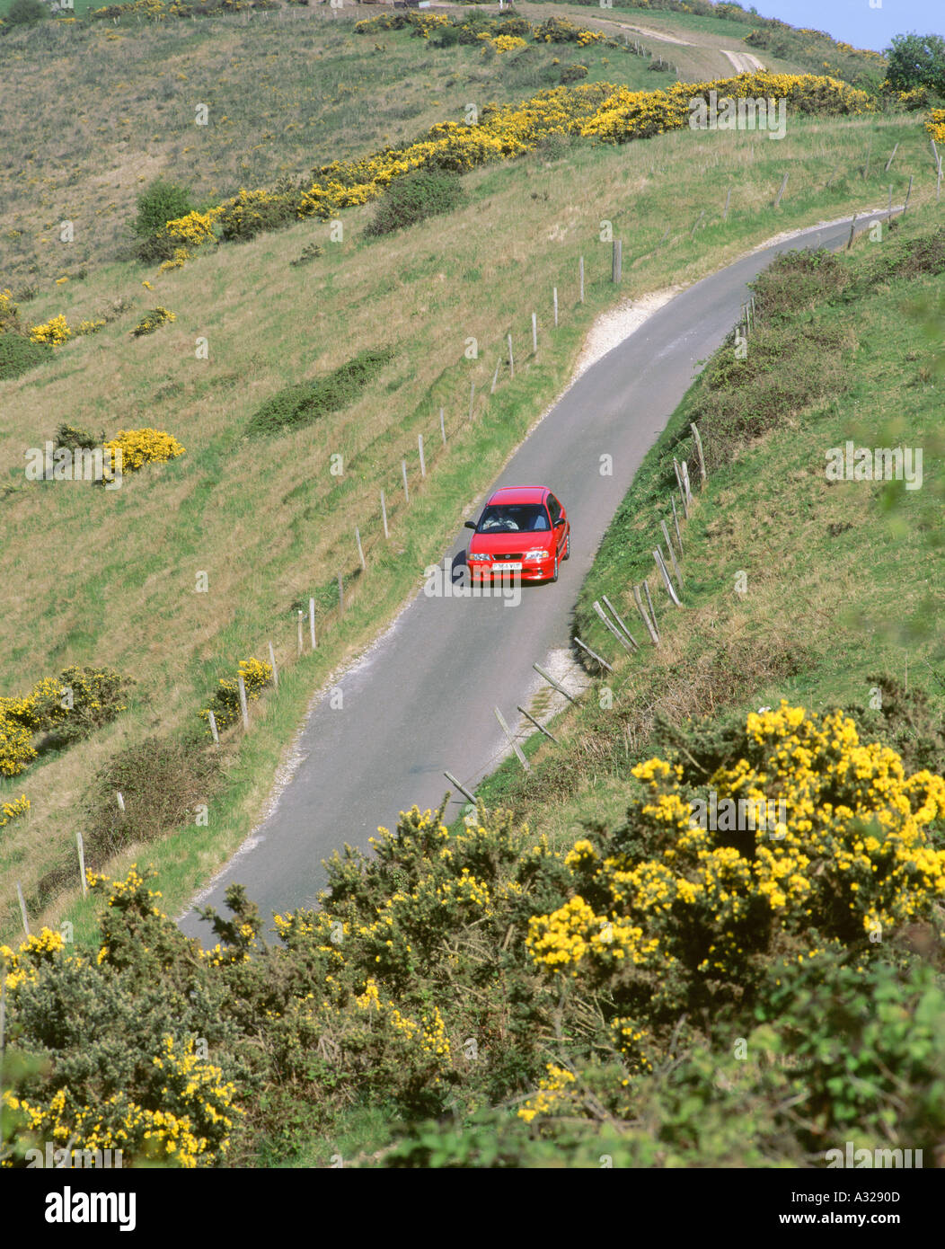 1996 Suzuki Baleno GS Sport sul paese di avvolgimento lane Dorset Foto Stock