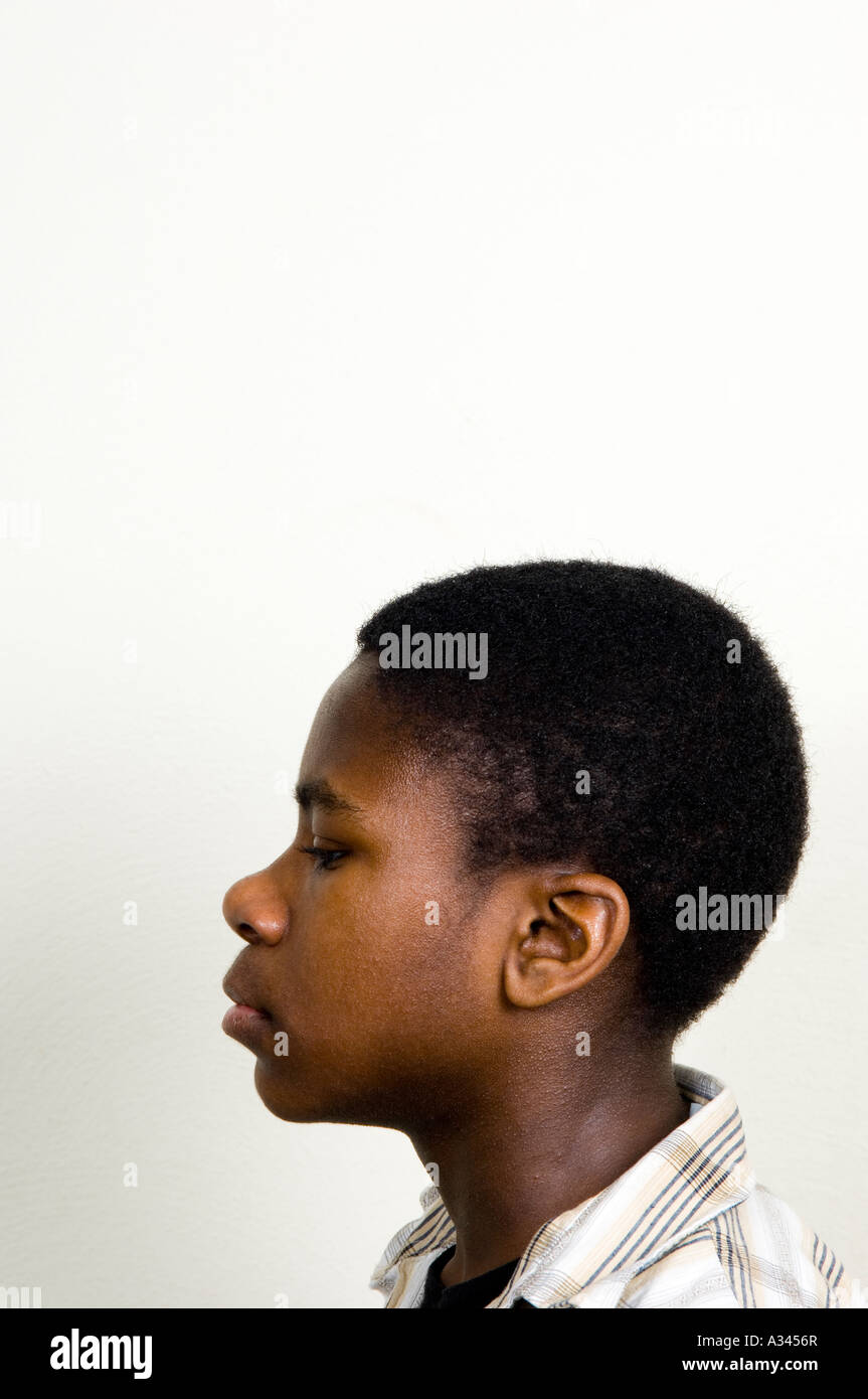 Profilo di un giovane africano American Boy Foto Stock