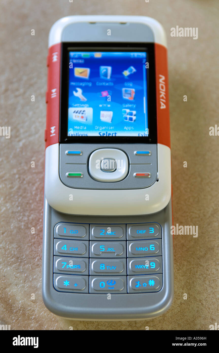 Un telefono mobile che mostra tutte le sue funzioni Foto Stock