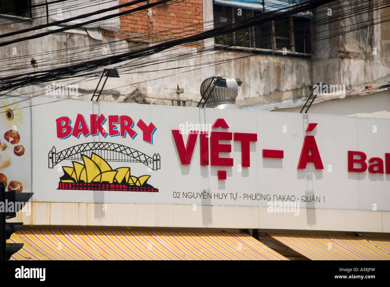 La panetteria australiano a Saigon. Nota la Sydney Opera House e Harbour Bridge Foto Stock