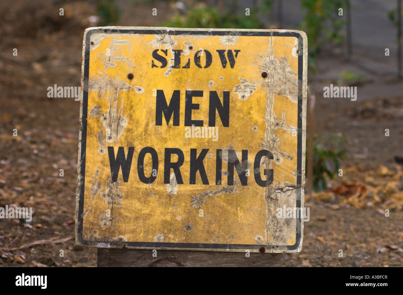 Battere lento uomini al lavoro in segno Kona Hawaii Foto Stock