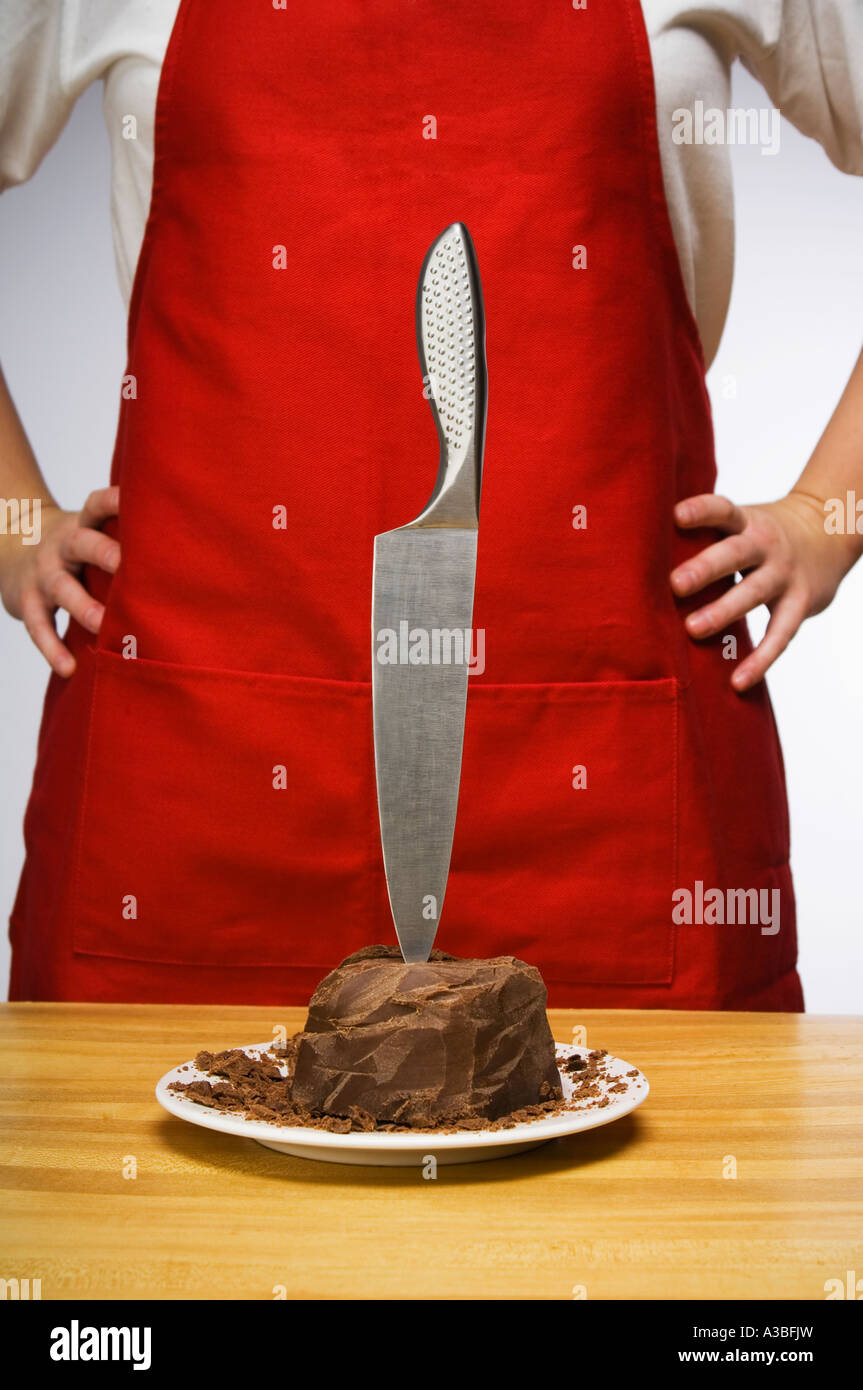 Il coltello nel blocco di cioccolato Foto stock - Alamy