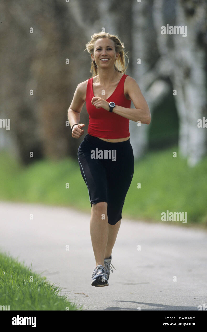 una donna da jogging Foto Stock