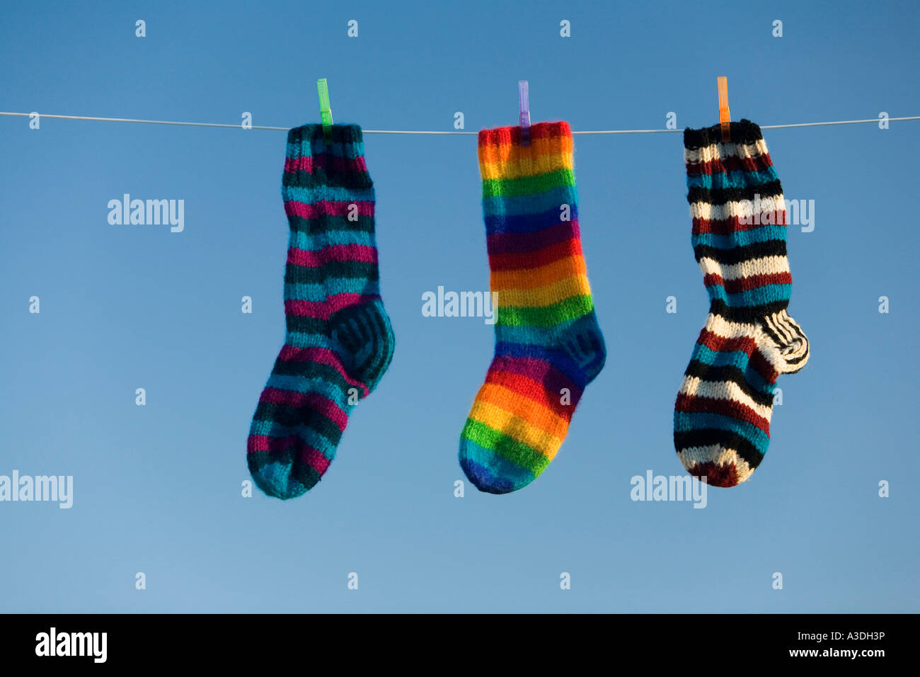 Tre calze a strisce Foto Stock