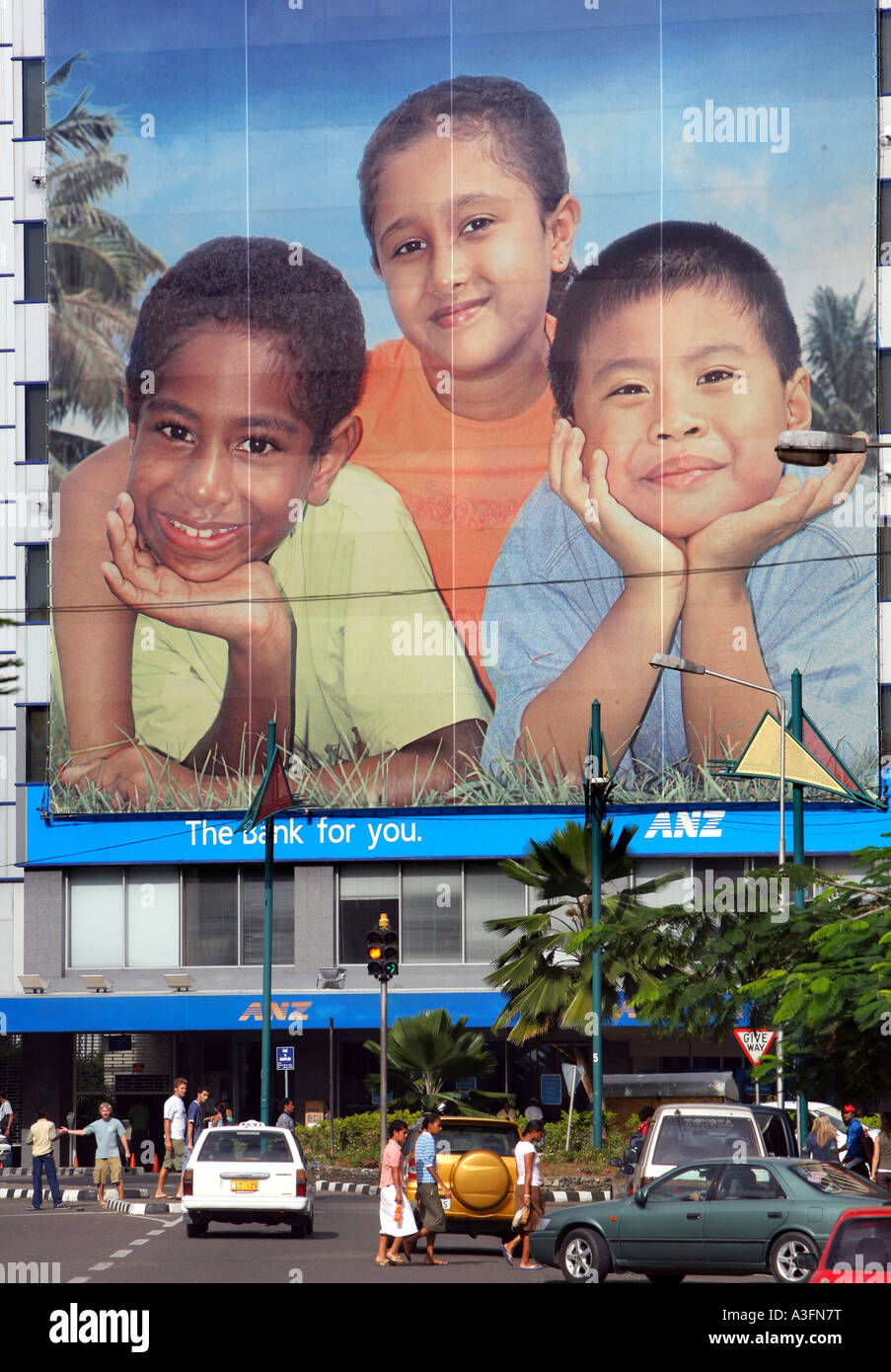 Fiji, Suva, Poster di una banca con le diverse razze dell'isola la capitale dello stato di Suva Foto Stock